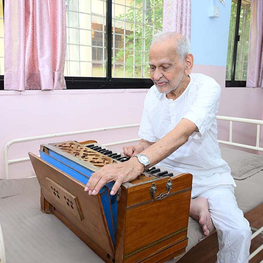 Senior citizen enjoying music therapy at Mamta Day Care Centre by SEEED Foundation
