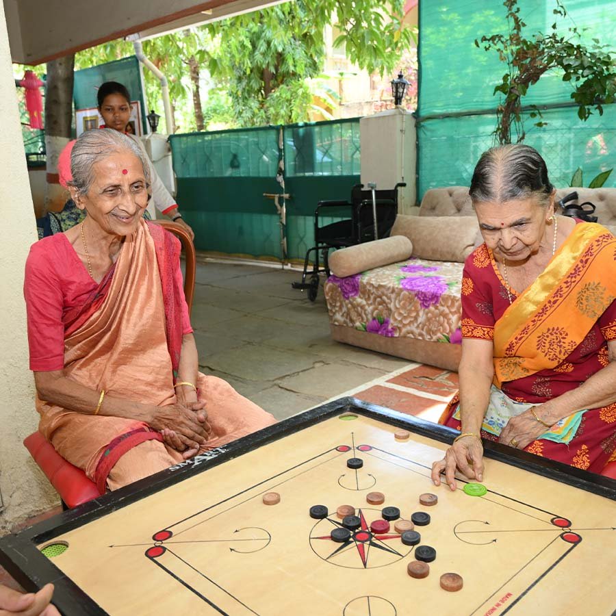 Senior citizens enjoying indoor games at SEEED Foundation’s Mamta Day Care Centre